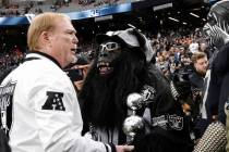 Raiders owner Mark Davis chats with fans prior to the start of an NFL football game between the ...