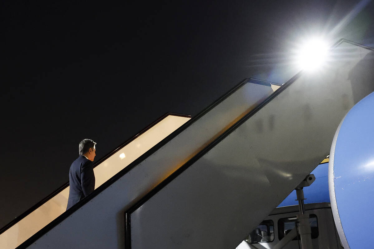 U.S. Secretary of State Antony Blinken boards a plane as he departs for Abu Dhabi, during his w ...