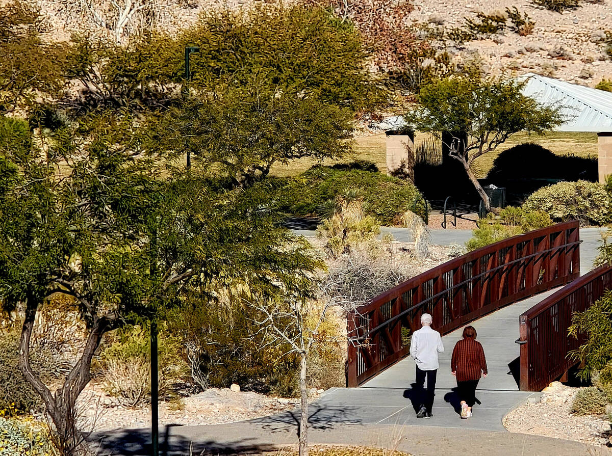 Late December walkers spend part of a sunny afternoon on the winding trails of Cottonwood Canyo ...