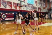Coronado's girls basketball team takes a 3-pointer during its 63-49 loss to Liberty on Jan. 8, ...