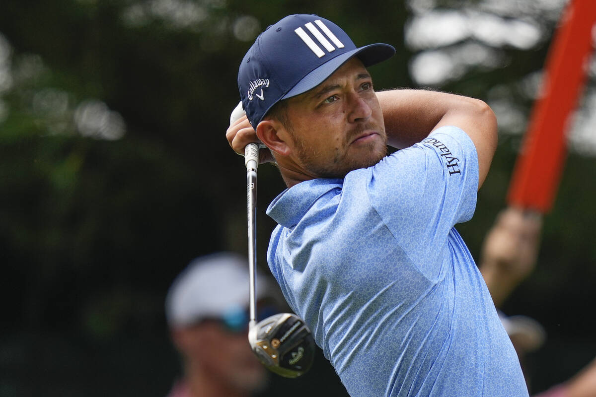 Xander Schauffele tees off on the 10th hole during the second round of the Travelers Championsh ...
