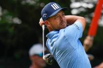 Xander Schauffele tees off on the 10th hole during the second round of the Travelers Championsh ...