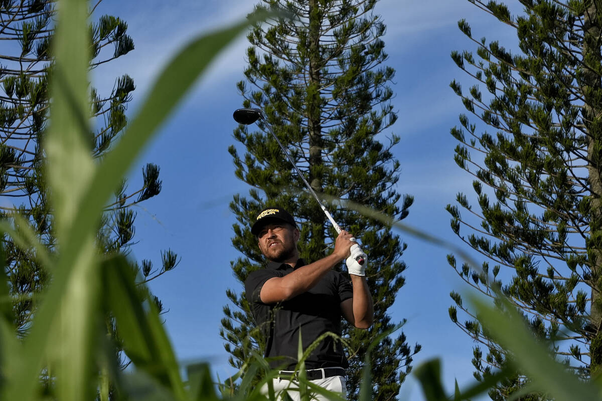 Xander Schauffele hits from the third tee during the first round of The Sentry golf event, Thur ...