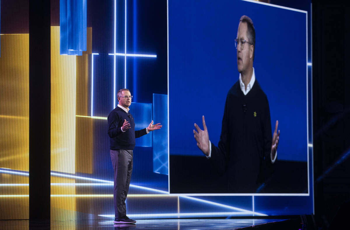 Walmart CEO Doug McMillon gives the keynote speech during the first day of CES at The Venetian ...