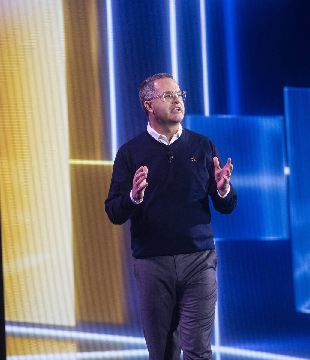 Walmart CEO Doug McMillon gives the keynote speech during the first day of CES at The Venetian ...