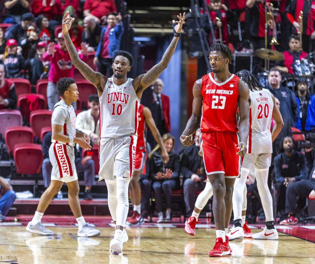 UNLV forward Kalib Boone (10) is pleased with their domination over the New Mexico Lobos during ...