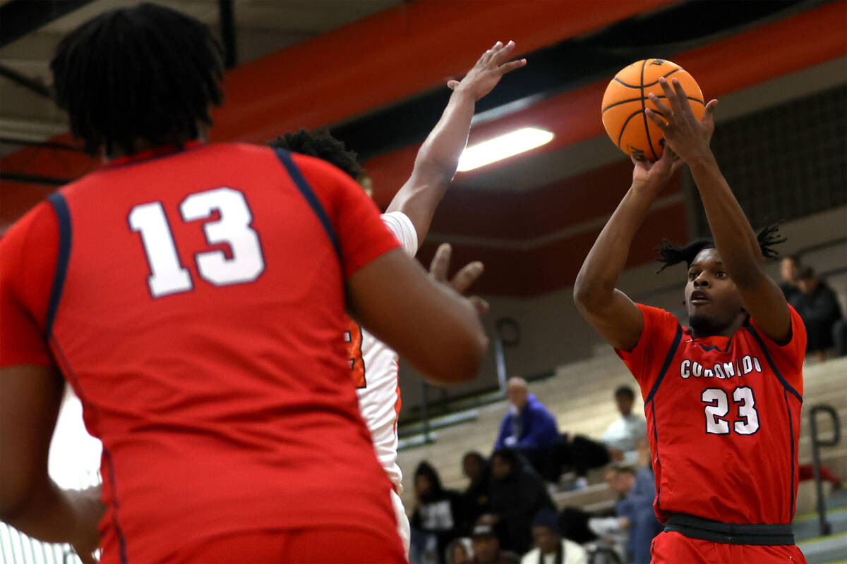 Coronado guard Josiah Cunningham (23) shoots during the first half of a high school basketball ...
