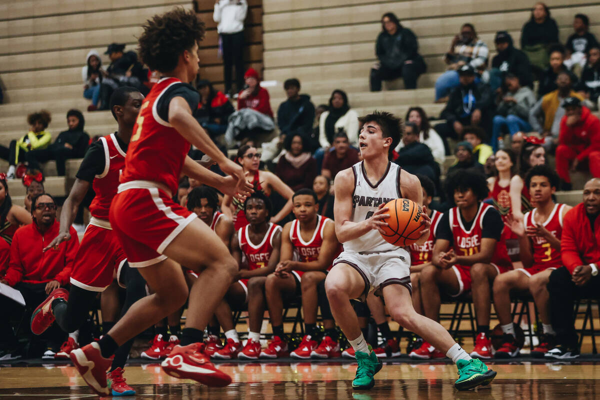 Cimarron-Memorial point guard Christian Cardona (0) looks to pass the ball to a teammate during ...