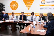 Senator Catherine Cortez Masto, third right, speaks as District Attorney Steve Wolfson, left, C ...