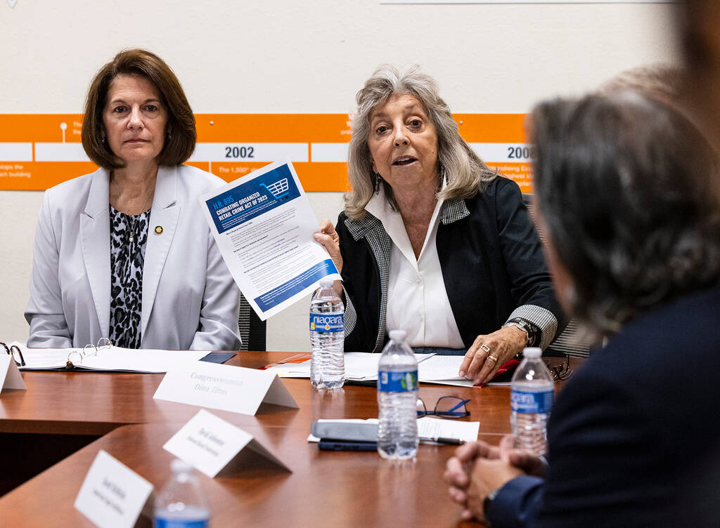 Congresswoman Dina Titus, displays the H.R. 895, Combating Organized Retail Crime Act of 2023, ...