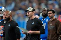 Detroit Lions offensive coordinator Ben Johnson watches during an NFL football game against the ...
