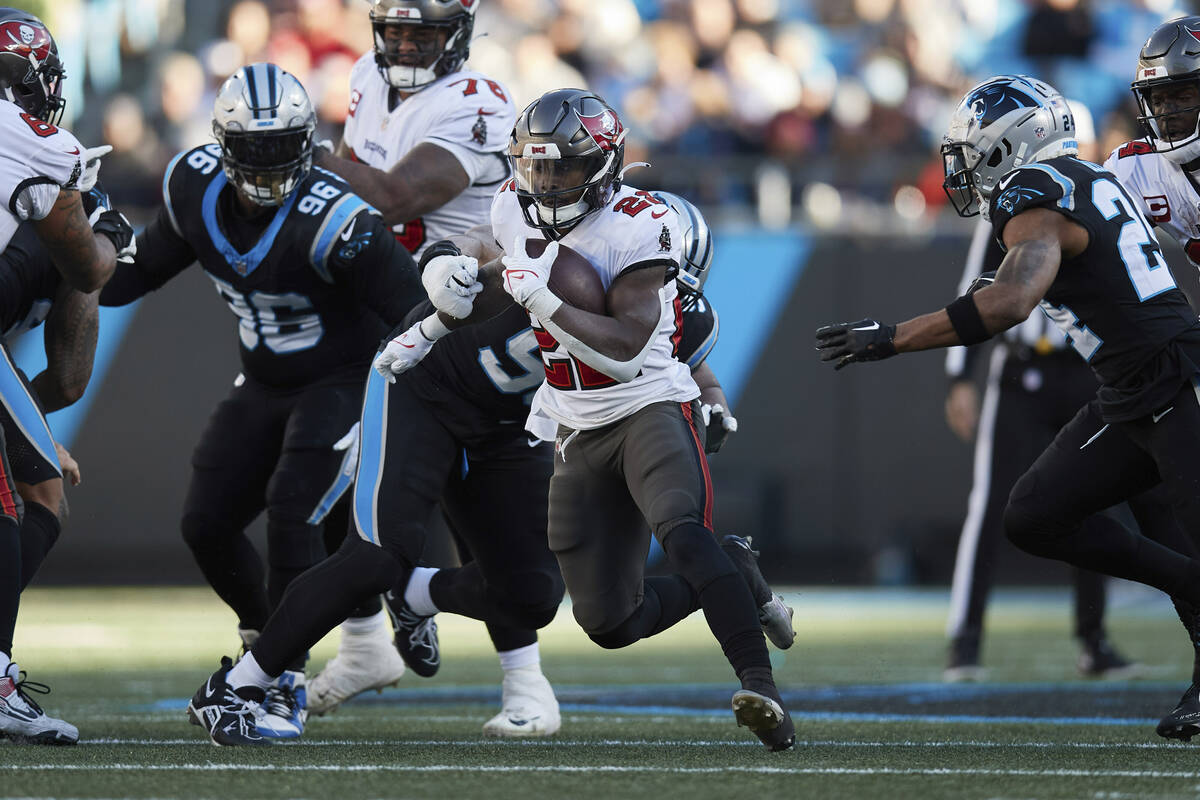 Tampa Bay Buccaneers running back Chase Edmonds (22) runs with the ball against the Carolina Pa ...