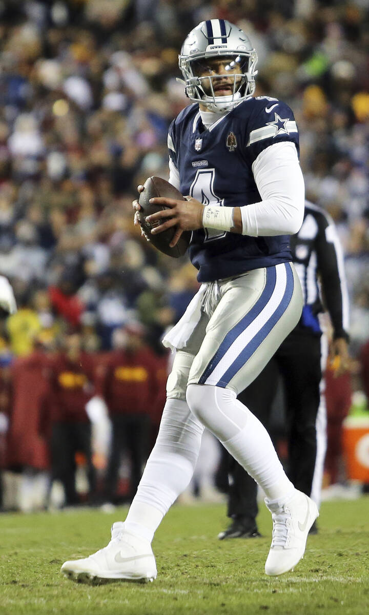 Dallas Cowboys quarterback Dak Prescott (4) throws during an NFL football game against the Wash ...