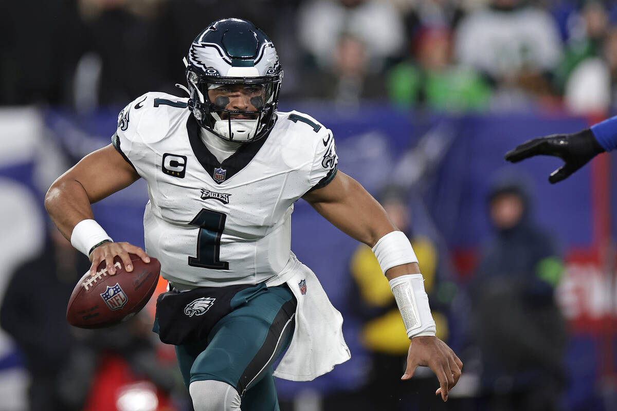Philadelphia Eagles quarterback Jalen Hurts (1) in action against the New York Giants during an ...