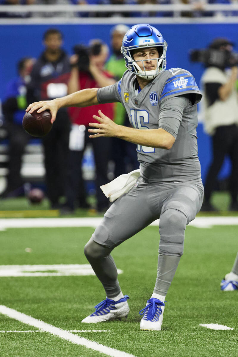 Detroit Lions quarterback Jared Goff (16) passes against the Minnesota Vikings during an NFL fo ...