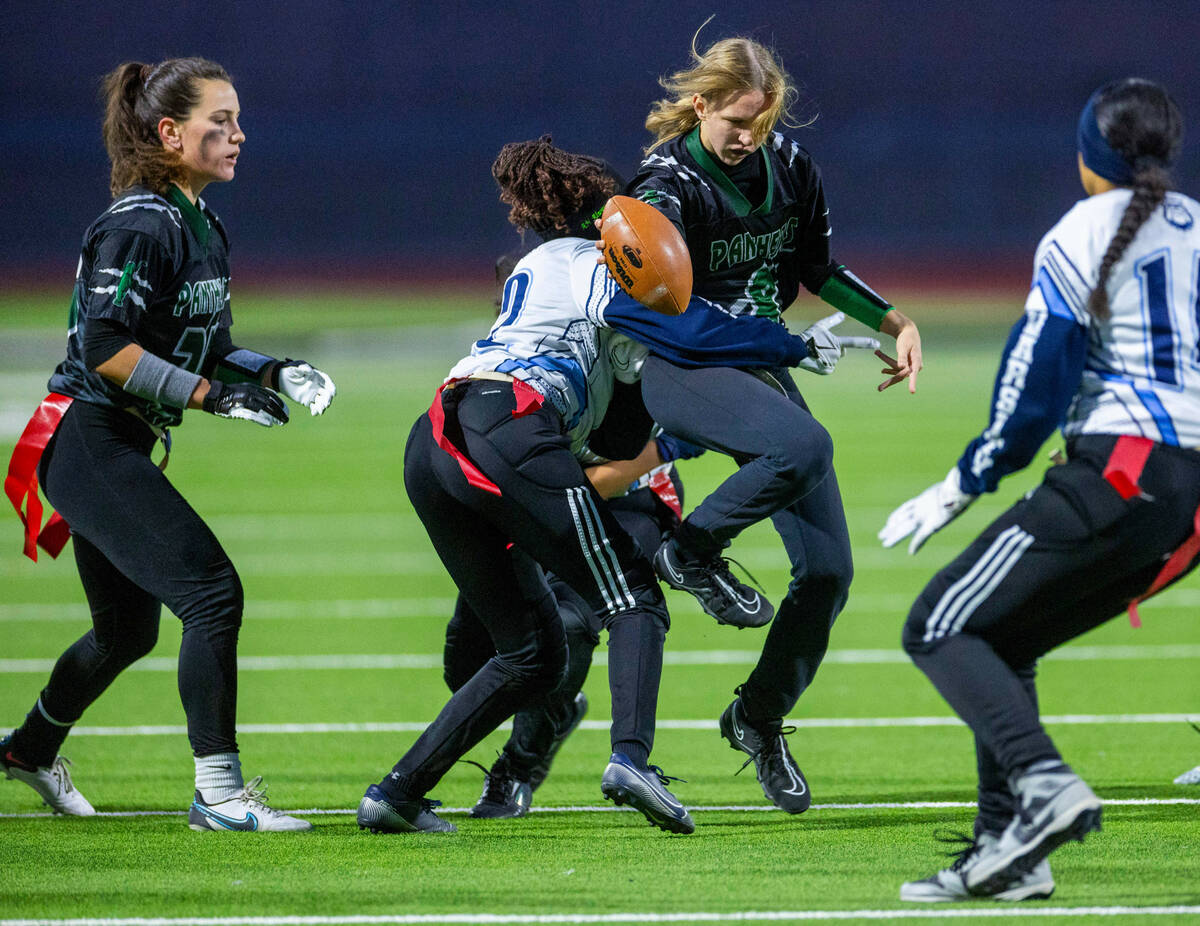 Palo Verde runner Vanessa Bonney (8) is wrapped up by Centennial defender Carissa McWilliams (1 ...