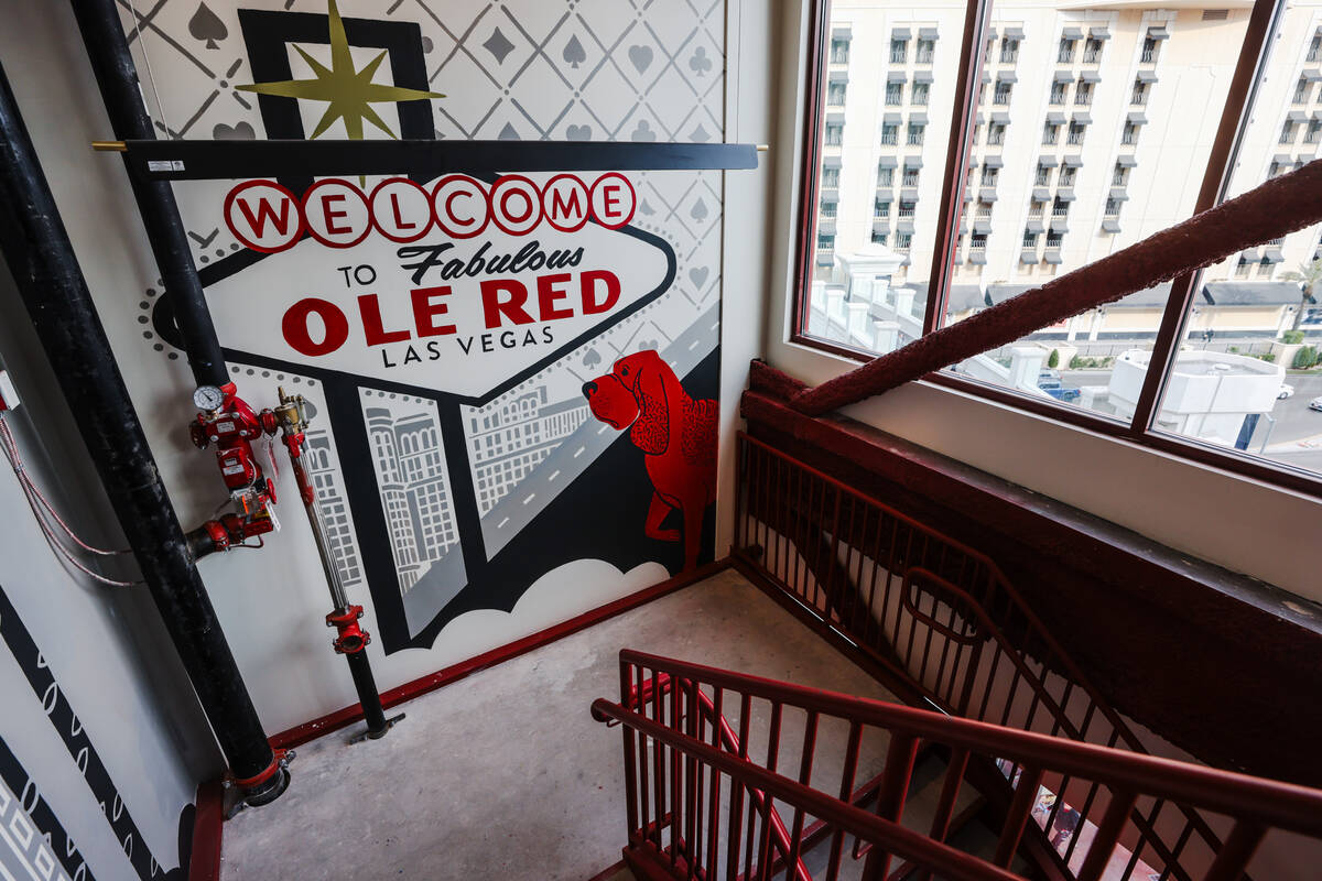 The staircase with murals at Ole Red Las Vegas, a restaurant, bar and live music venue by count ...
