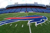 FILE - The Buffalo Bills logo is displayed opn the field at Highmark Stadium before an NFL foot ...