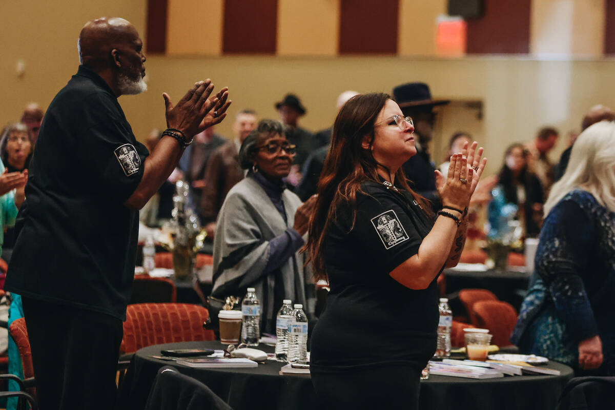 Worshippers clap along to music during the Citywide Unity Prayer Celebration at the Historic Fi ...