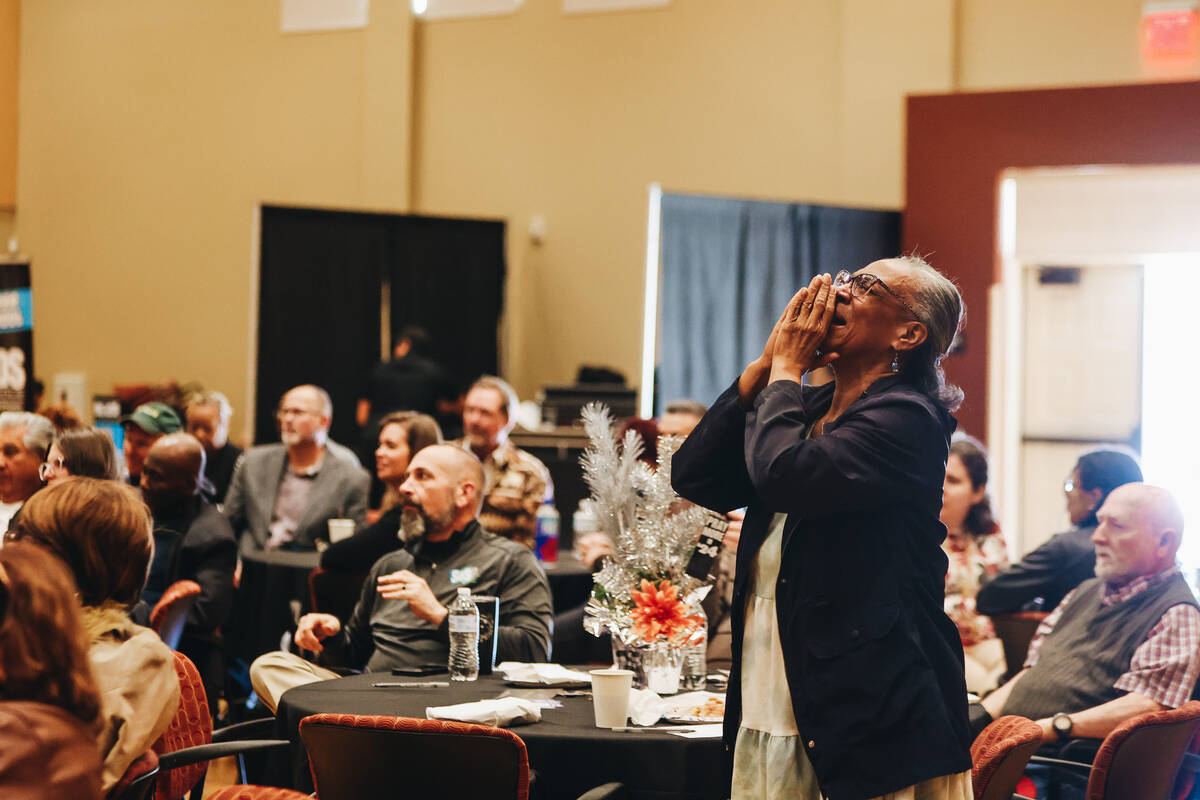 A worshipper prays during the Citywide Unity Prayer Celebration at the Historic Fifth Street Sc ...