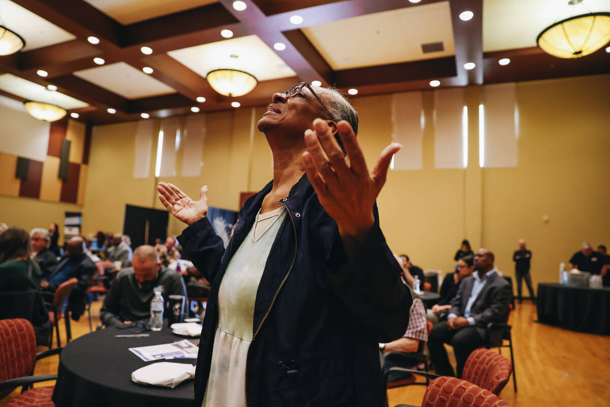 A worshipper prays during the Citywide Unity Prayer Celebration at the Historic Fifth Street Sc ...