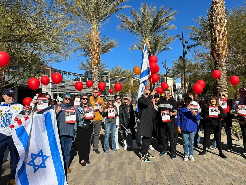 People walked in downtown Summerlin in west Las Vegas on Sunday, Jan. 14, 2024 to mark 100 days ...