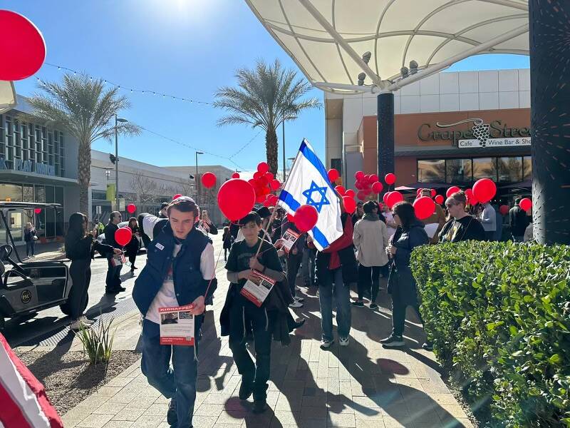 People walked in downtown Summerlin in west Las Vegas on Sunday, Jan. 14, 2024 to mark 100 days ...