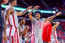 UNLV forward Rob Whaley Jr. (5) and teammates are excited about the win against the New Mexico ...