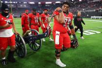 UNLV Rebels offensive lineman Leif Fautanu (79) pulls the Fremont Cannon after his team's win a ...