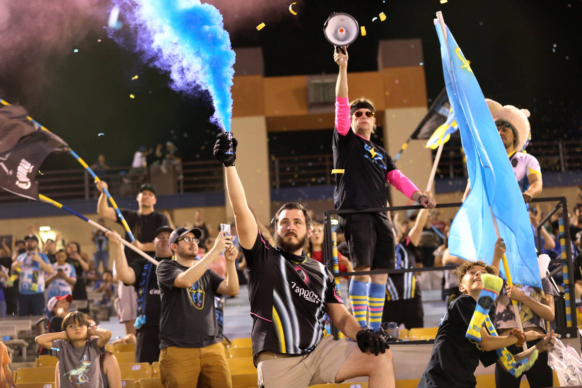 Fans celebrate a goal by the Las Vegas Lights against the Tacoma Defiance in the second half of ...