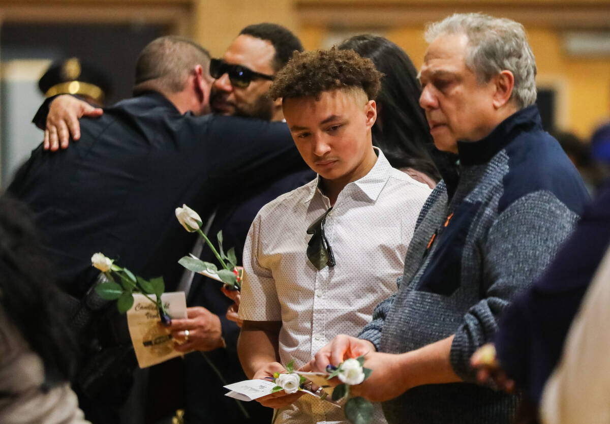 Robert Craft, right, father of CCSD Police Officer Andrew Craft who recently died of a medical ...