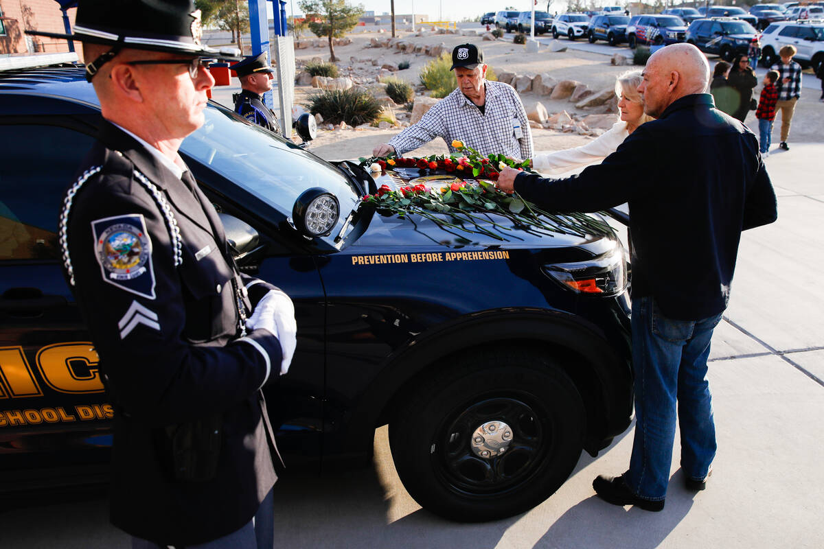 Toni and Mark Berry, left, the grandparents of CCSD Police Officer Andrew Craft’s girlfr ...