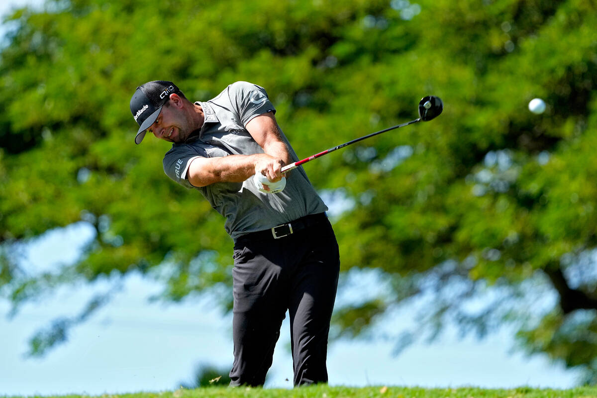 Taylor Montgomery hits from the second tee during the third round of the Sony Open golf event, ...
