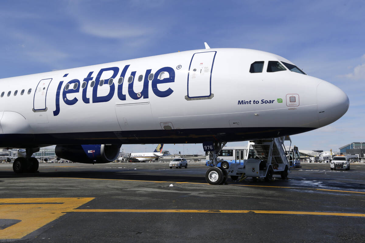 FILE - A JetBlue airplane is shown at John F. Kennedy International Airport in New York, March ...