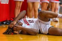 Arbor View forward Brian “Chef” Townsend (11) reacts to a hard foul by Bishop Gor ...