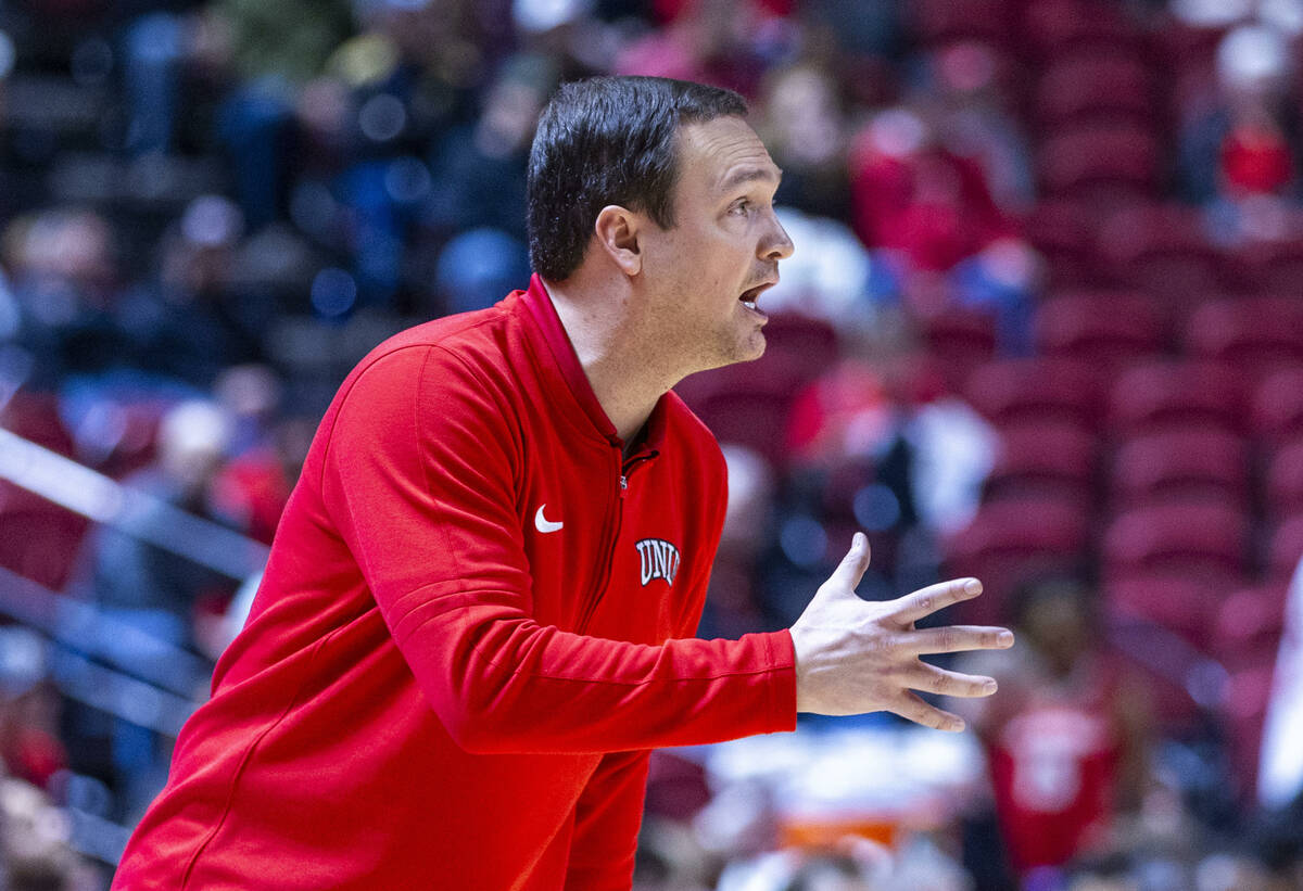 UNLV head coach Kevin Kruger keeps his players battling as they dominate the New Mexico Lobos d ...