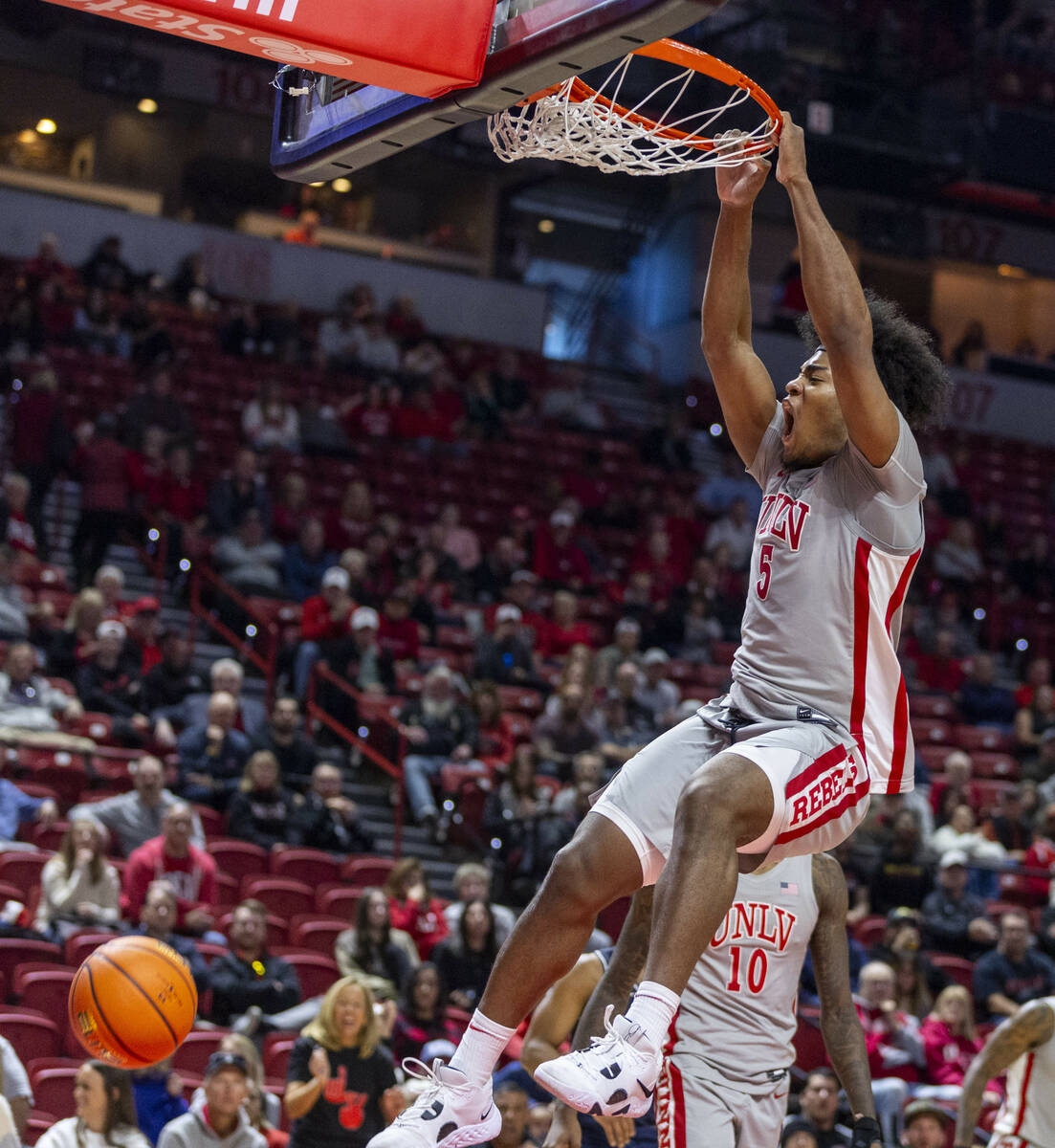 UNLV forward Rob Whaley Jr. (5) dunks the ball against the Utah State Aggies during the first h ...