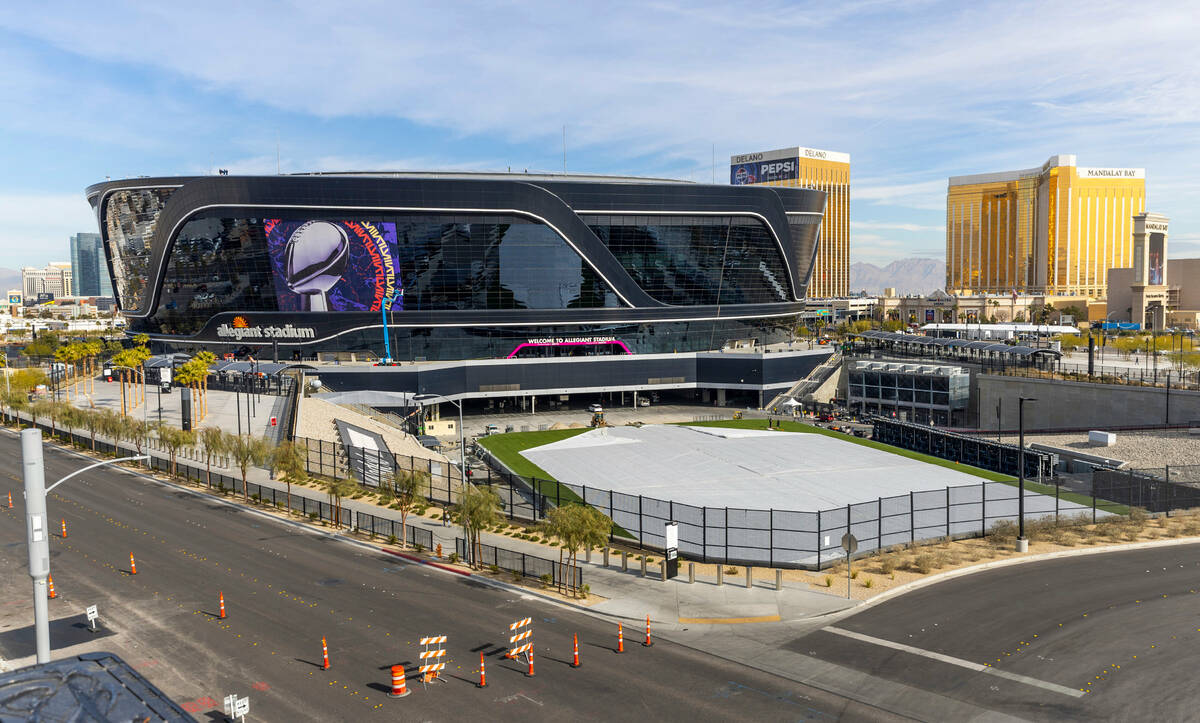 The field is worked on as Super Bowl preparations continue at Allegiant Stadium on Wednesday, J ...