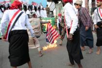 Houthi supporters burn a representation of the U.S. flag. (AP Photo/Hani Mohammed, File)