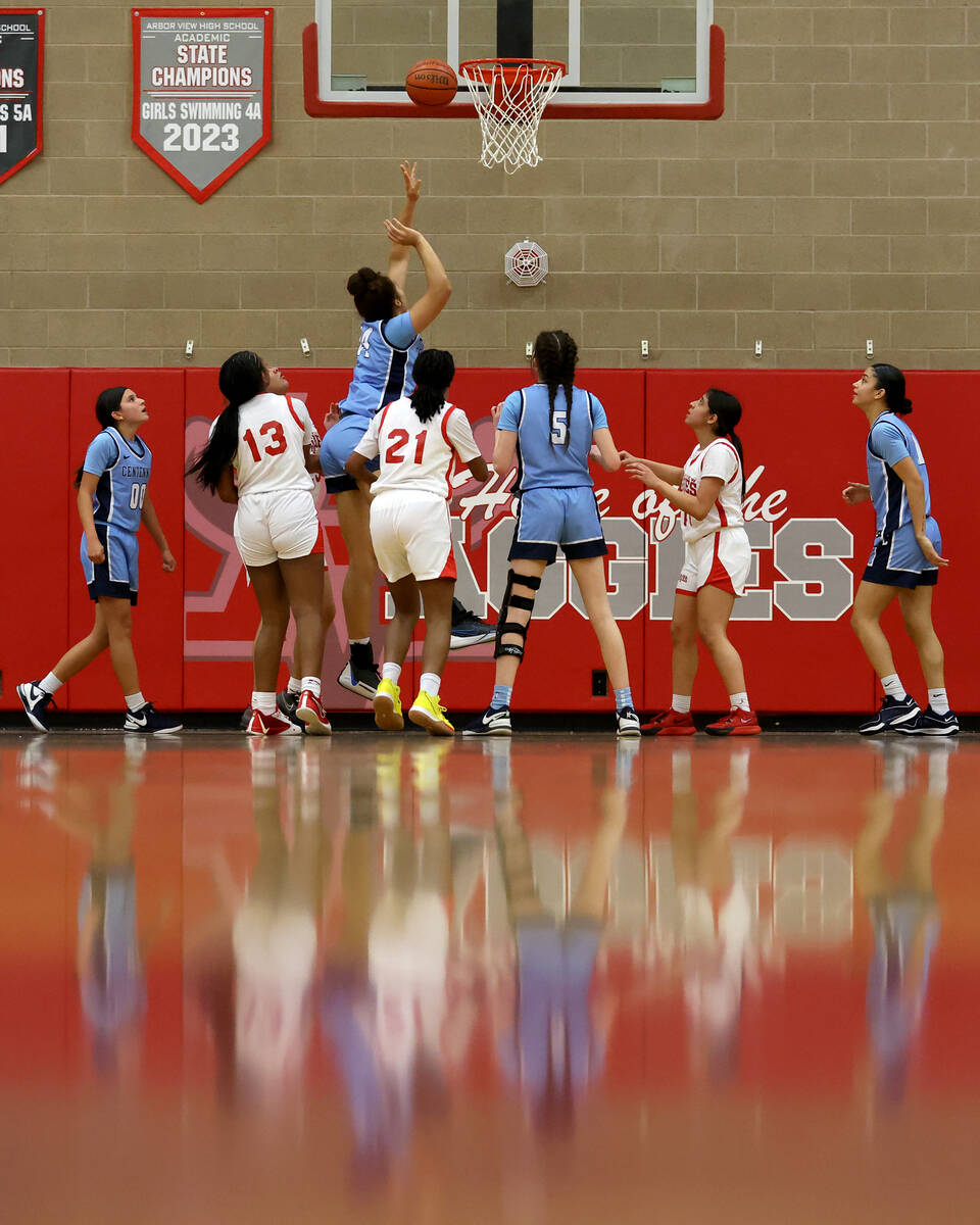 Centennial shoots against against Arbor View during the second half of a high school basketball ...