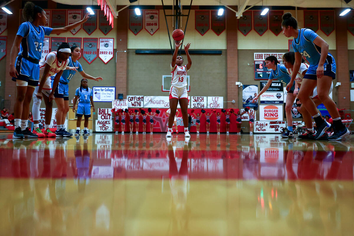 Arbor View's Talyiah Mckinney (13) shoots a free throw during the first half of a high school b ...