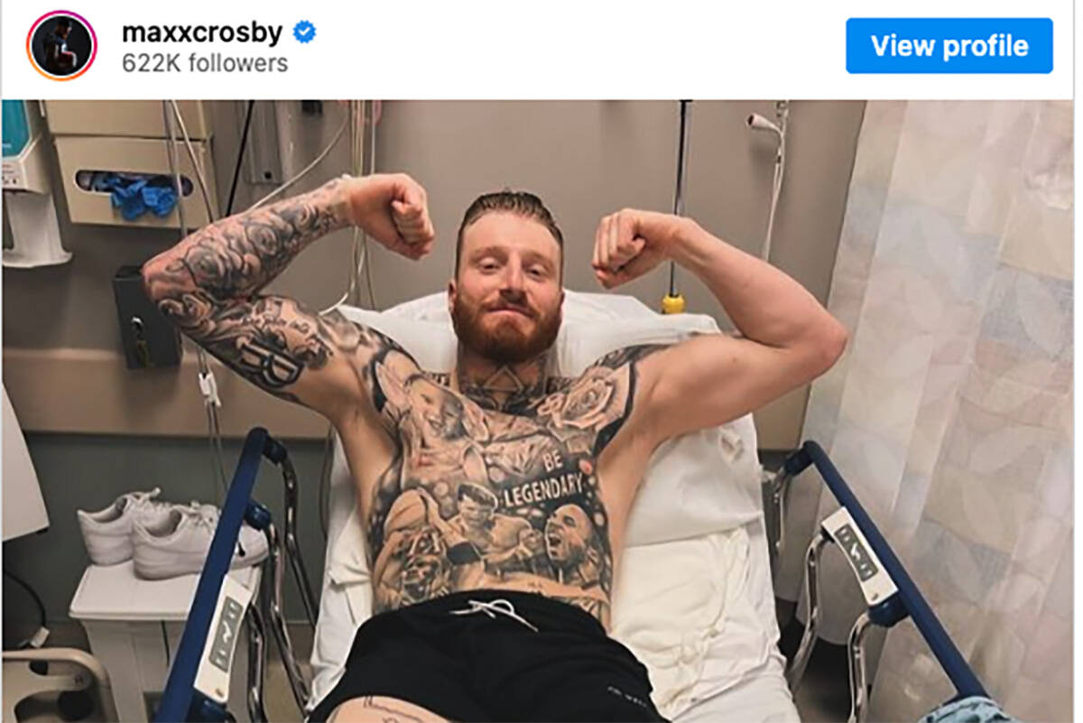 Maxx Crosby flexes in a hospital bed in an Instagram post. (maxxcrosby/Instagram)