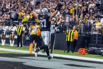 Raiders tight end Michael Mayer (87) celebrates a two-point conversion reception against the Pi ...