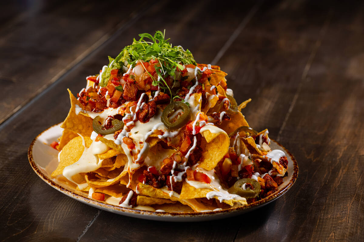 A heap of nachos ranks among the 2024 Super Bowl offerings at Tailgate Social Sports Bar & Gril ...