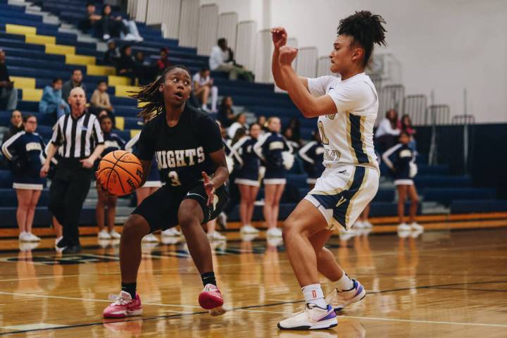 Democracy Prep point guard Bray’ana Miles (3) keeps the ball in her posession during a g ...