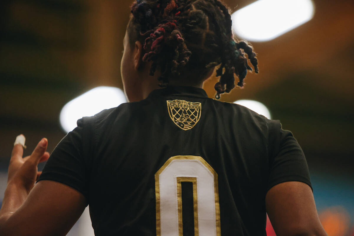 The word “sisterhood” is seen on the back of a Democracy Prep jersey during a gam ...