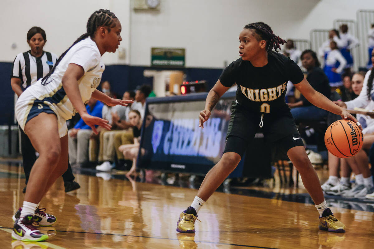 Democracy Prep guard Mikiah Verdum (0) dribbles the ball during a game against Spring Valley at ...