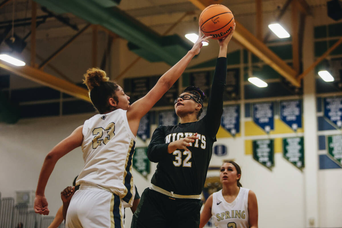 Democracy Prep forward Brooklyn Williams (32) goes for a layup during a game against Spring Val ...