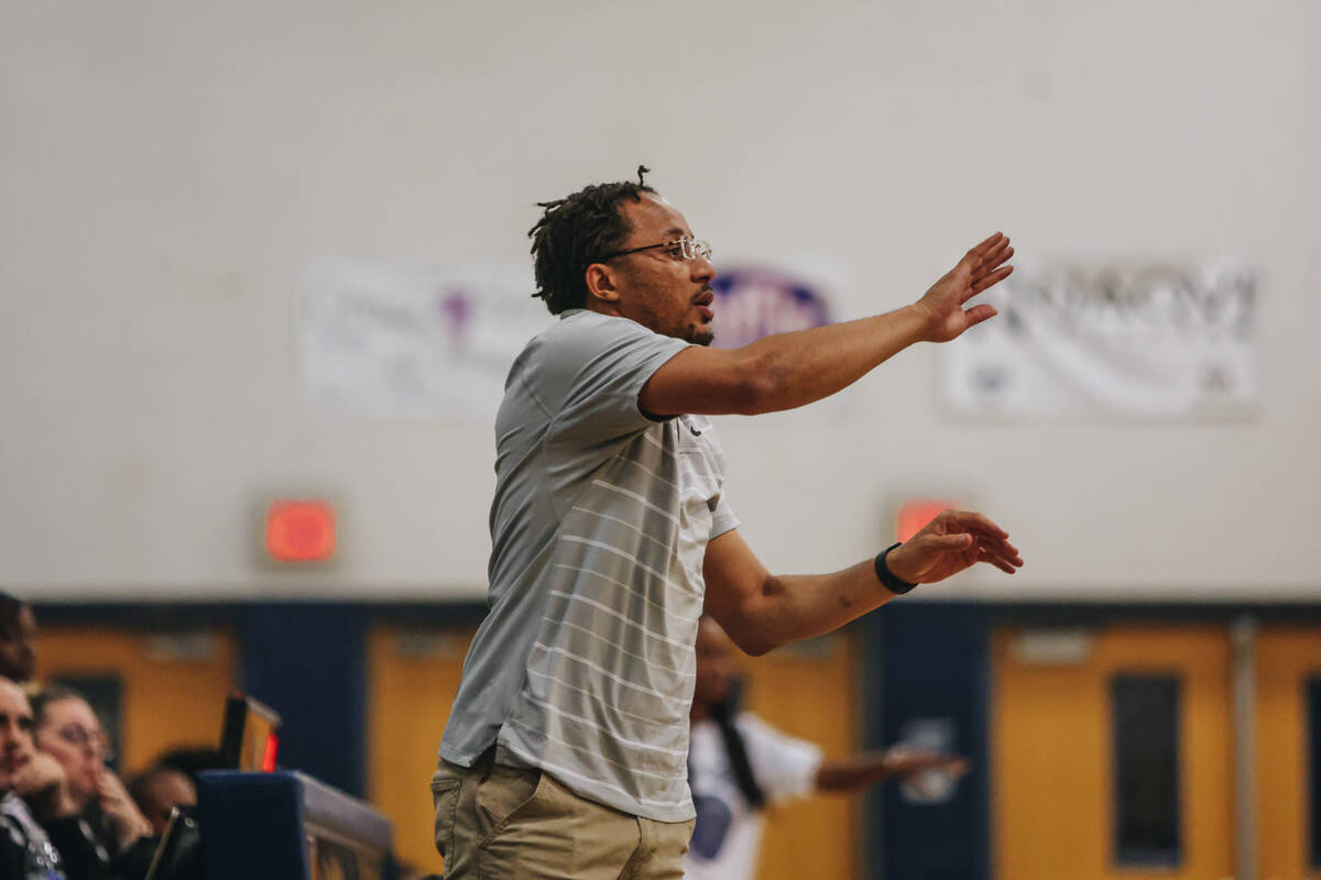 Democracy Prep girls basketball head coach Julius Barren coaches his team from the sidelines du ...