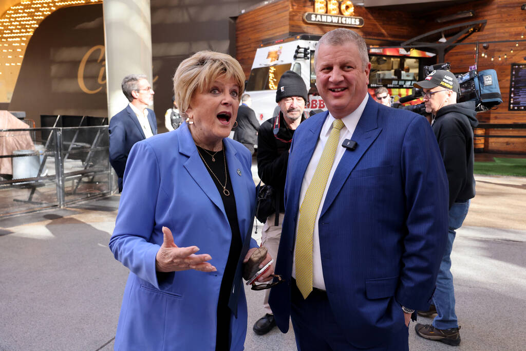 Las Vegas Mayor Carolyn Goodman and Golden Gate CEO Derek Stevens participate in a celebration ...